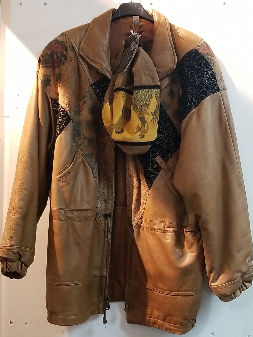 Tan Leather Jacket with Decorative Accents and Hat